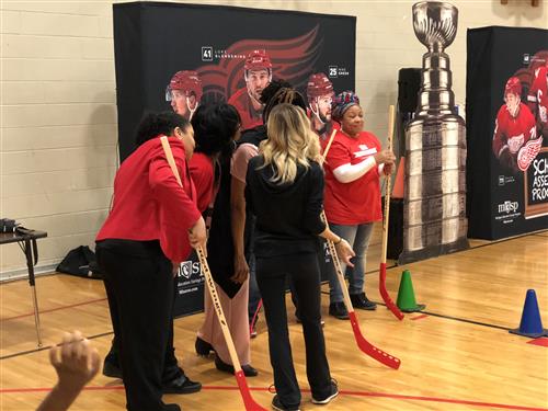 Women with hockey sticks 