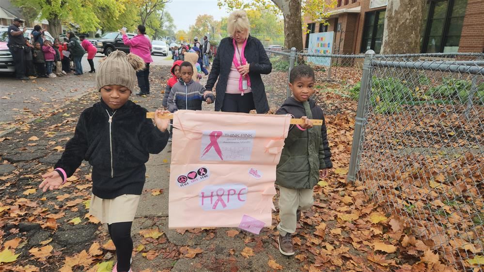  Mann Learning Community students and staff participate in a Breast Cancer Awareness walk