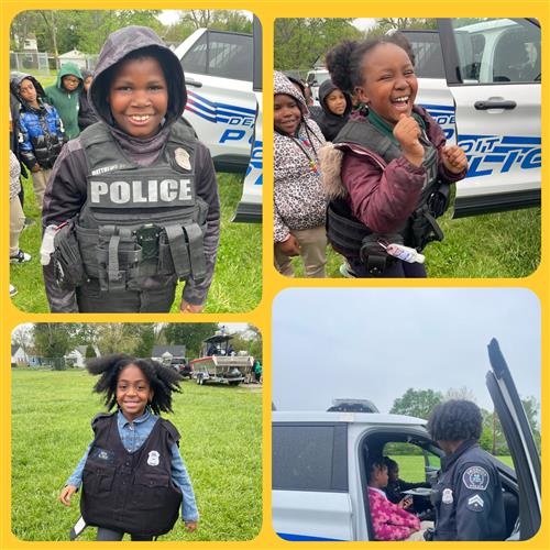 Mann students posing as neighborhood police officers on college and career day