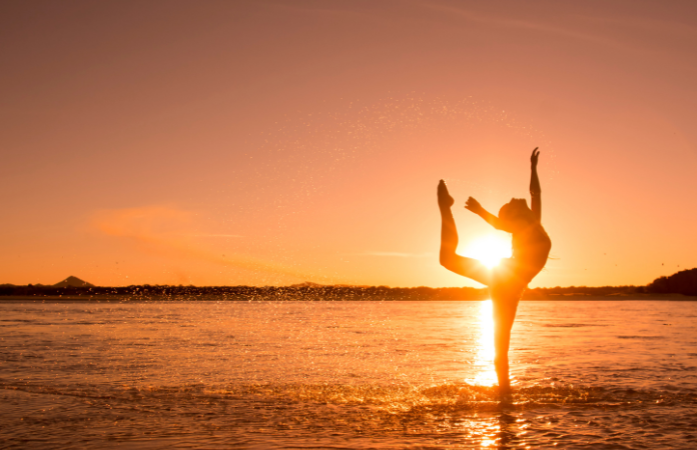  Dancer posing on the beach