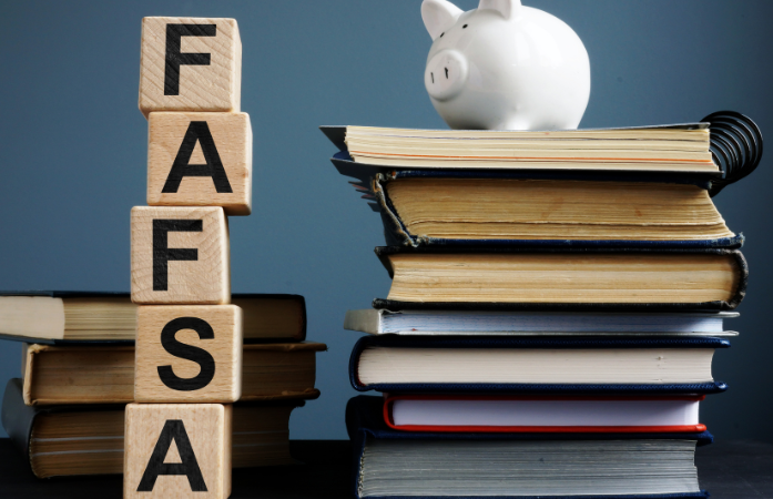FAFSA blocks with books stacked and a piggy bank