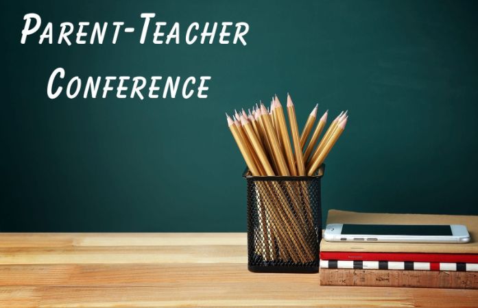  board with parent teacher conferences written on it