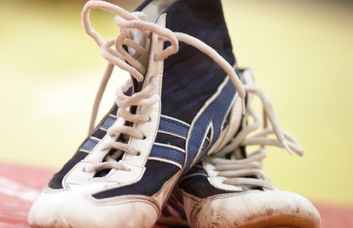  wrestling shoes on the mat