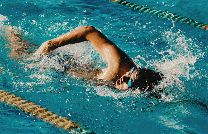 swim child mid stroke