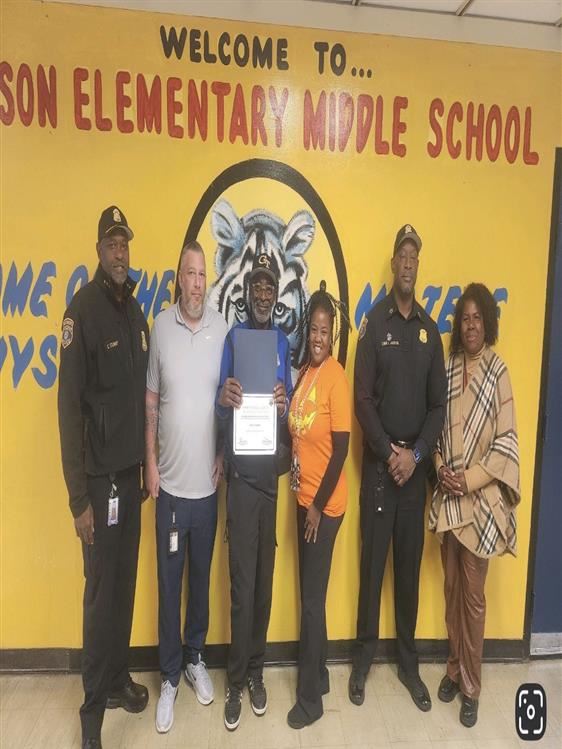  office knight holding certificate