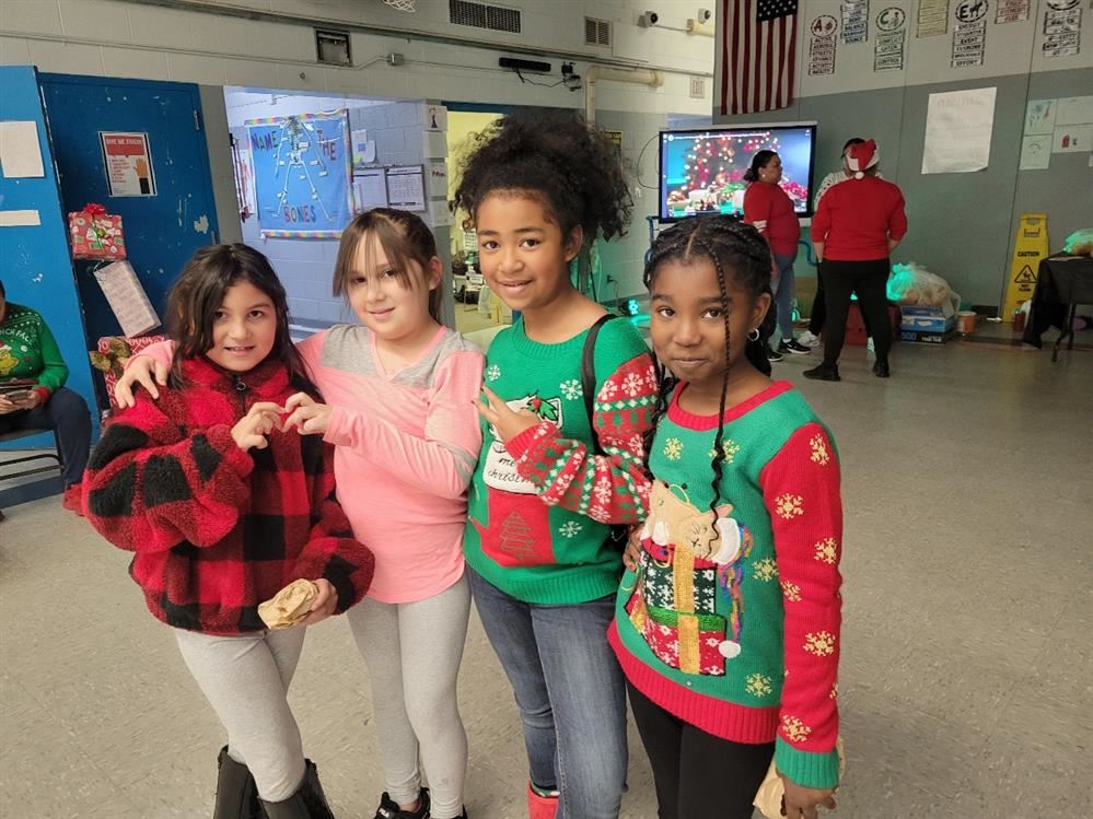  Students posing for a picture during our holiday dance. 