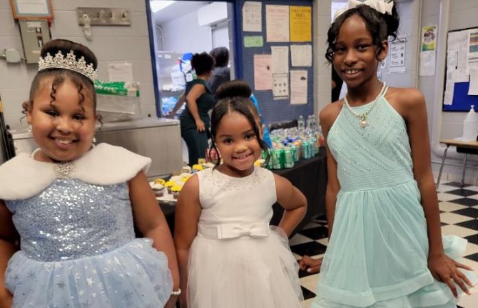  3 girsl wearing beautiful dresses for Father/daughter, Mother/Son Dance