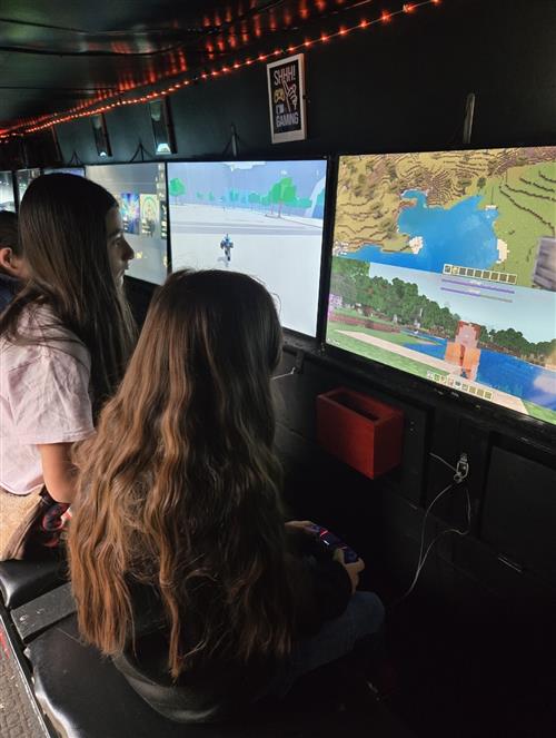 2 girls playing video games