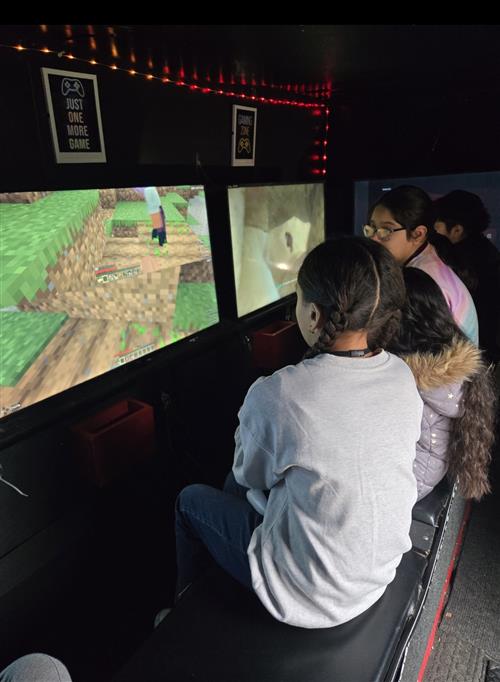 2 girls playing video games
