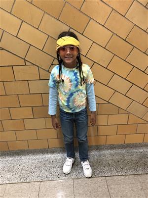 student in 70s clothing