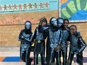 boys in skeleton costumes