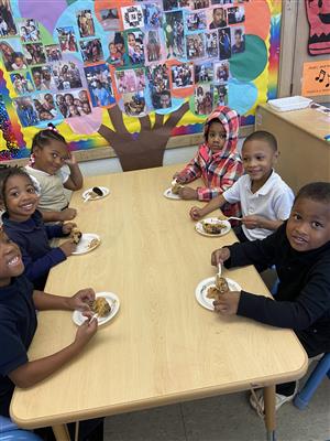 students making birdfeeders