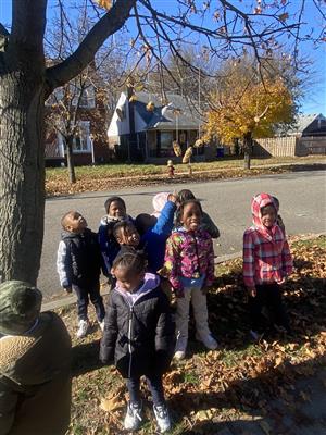 students making birdfeeders