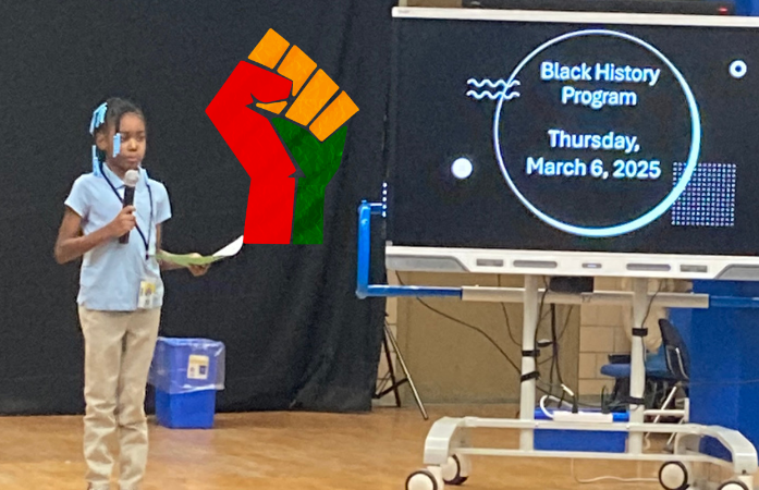  Student on stage during black history program