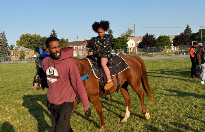  Student riding a horse