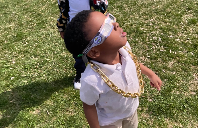  student viewing the solar eclipse