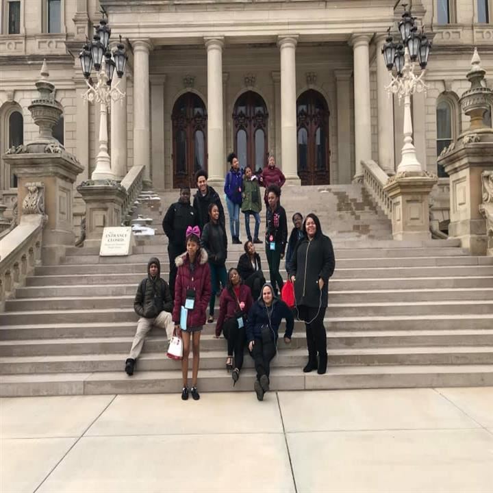  students pose for Picture on steps of State Capital