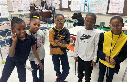 Students posing for math bee competition