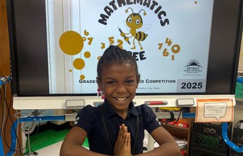 Girl posing for math bee competition