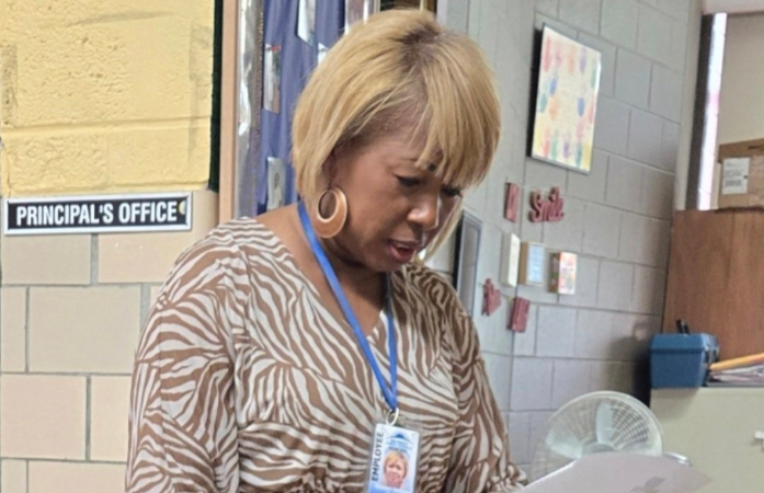  Principal at her office door