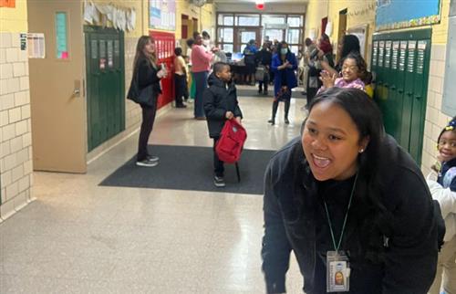 Staff clapping for students