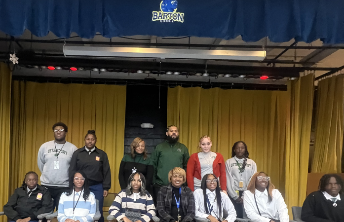 Staff and students posing for a picture