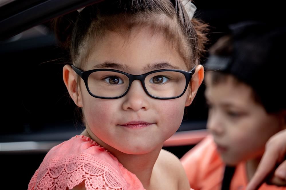  a girl wearing glasses