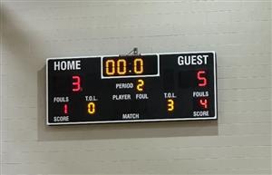 scoreboard with final score Nichols guest Marcus Garvey Home