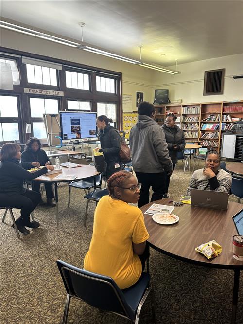 parents at parent meeting in library
