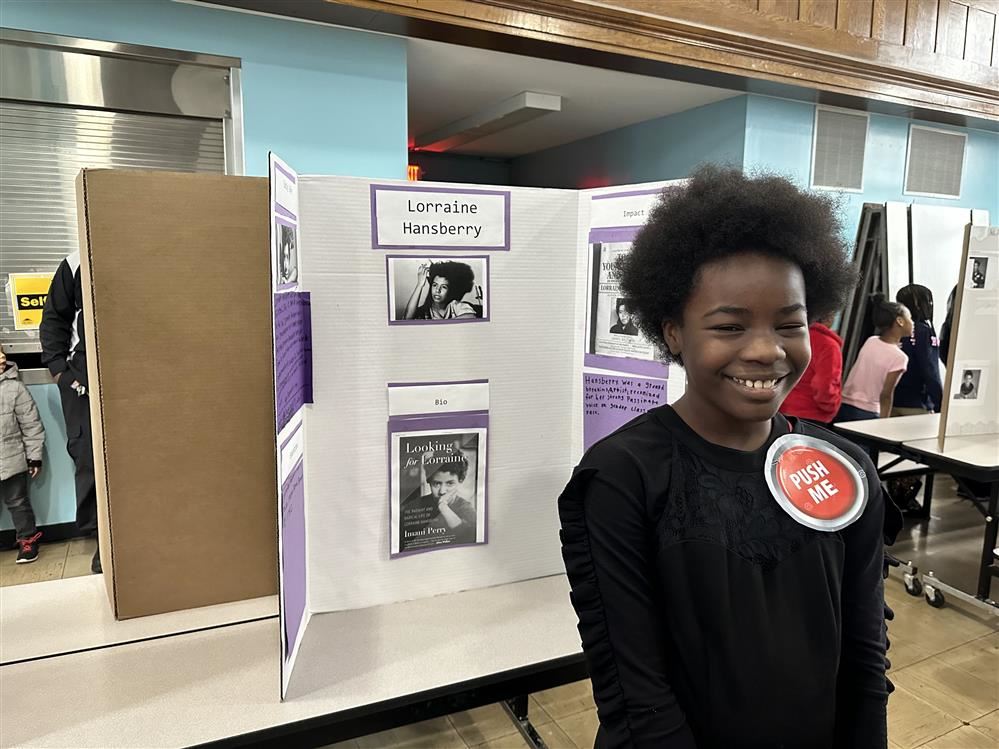  Student standing near African American History Project