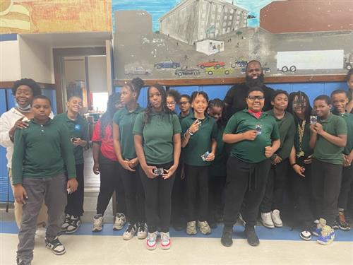 students with football star