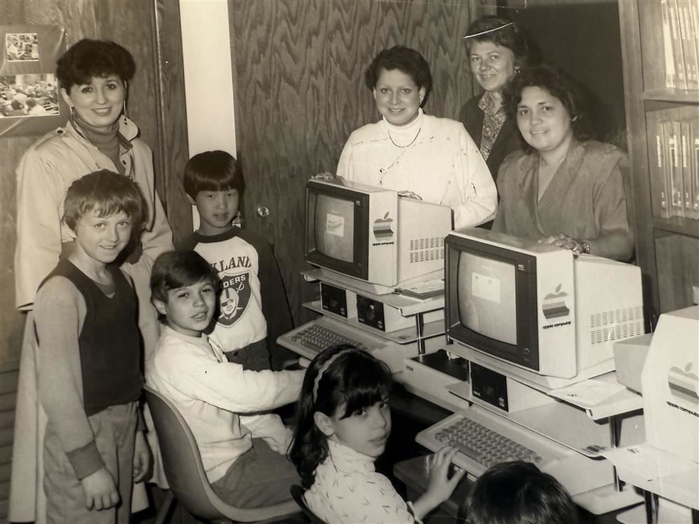  A vintage 1980's photo with teachers  and students.