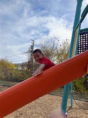 CHILD ON SLIDE