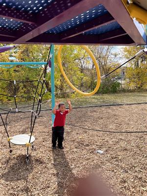 CHILD ON PLAYGROUND