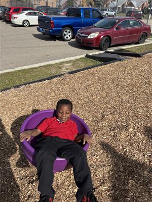 CHILD ON PLAYGROUND