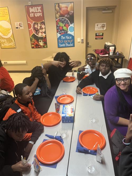 Scholars at table 