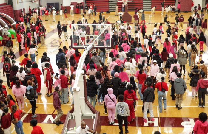  Students dancing in school gym during ice cream social