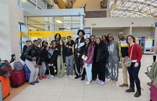  Students posing at the train station