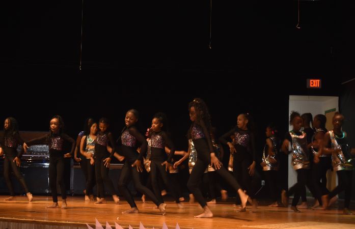  Dance team performing on stage