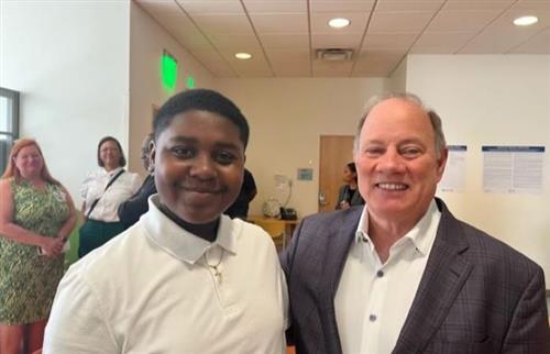 Caleb Holmes pictured with Mayor Mike Duggan
