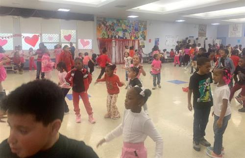  elementary students dancing at the Valentine's Dance