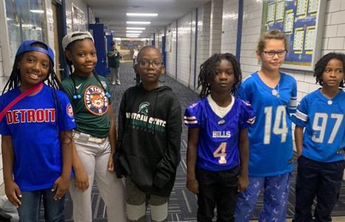  4th grade students dressed in gear representing different sports teams