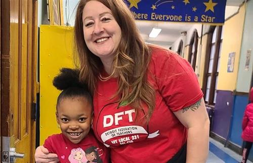 teacher and student smiling