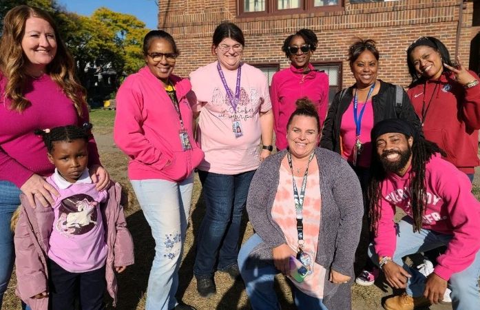  staff and kids in pink