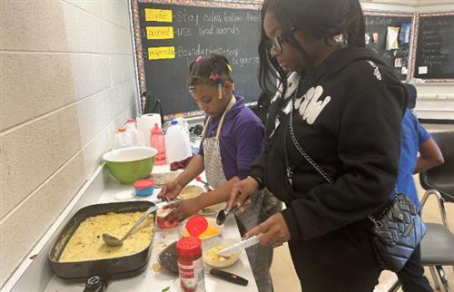  Staff and students cooking!