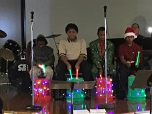 O Christmas Tree ( students playing the bucket drums) 