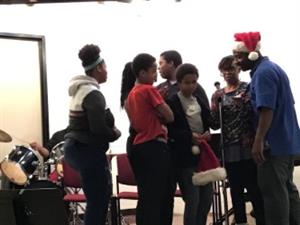 Students and Staff Sing a Long Silent Night and We Wish You A Merry Christmas 