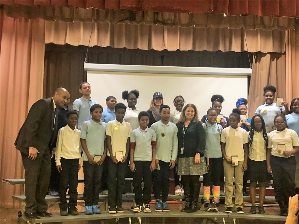  Picture of students with Principal Pratt and BI at the Graduation