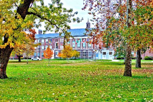  picture of Western High School from Clark Park in the fall.