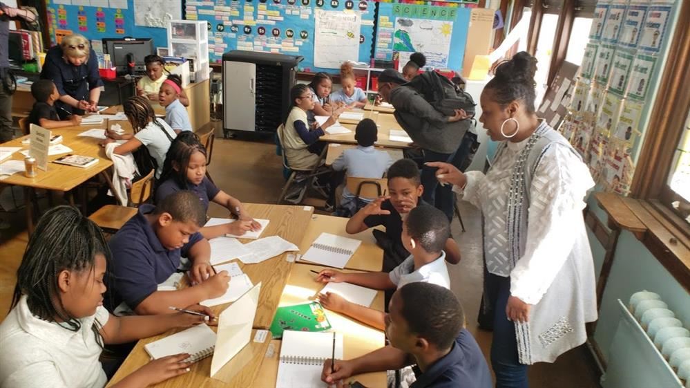 5th Grade students completing class work 5th Grade students completing class work